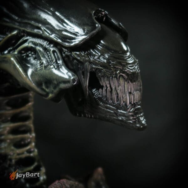 Close-up of a menacing alien creature figure.