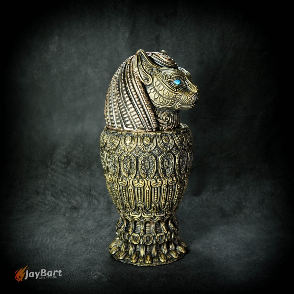 Ornate decorative lion vase with intricate patterns.