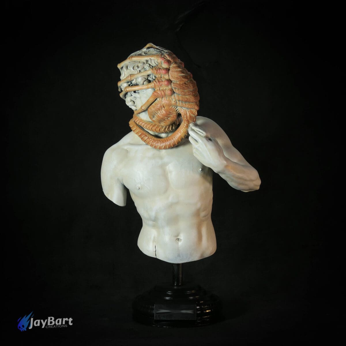 Surreal bust with alien facehugger sculpture