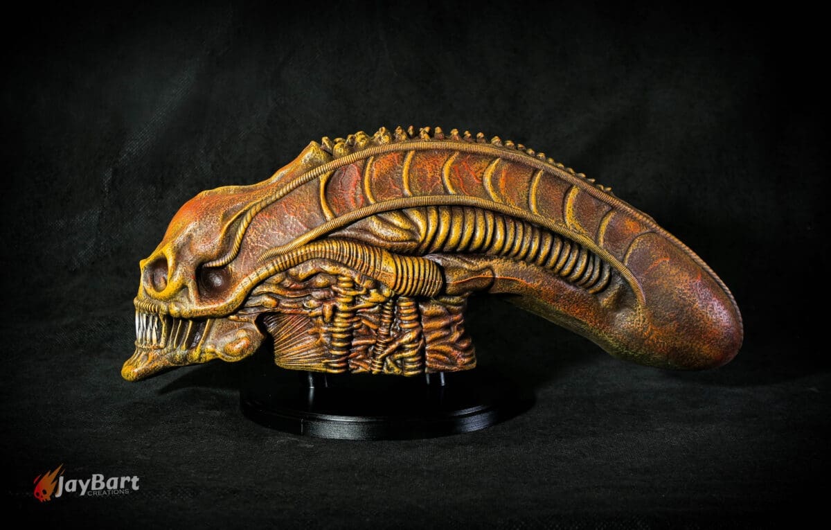 Alien skull sculpture with detailed textures.