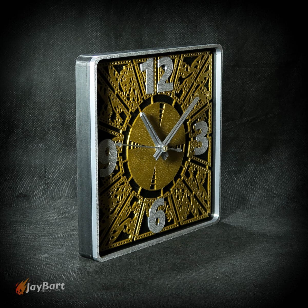 Geometric wall clock with metallic design.