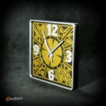 Intricate black and gold decorative wall clock