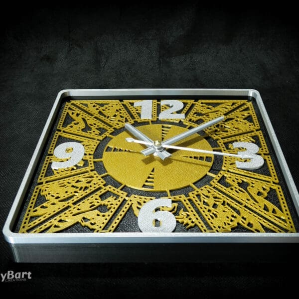 Gold and silver square decorative wall clock face.