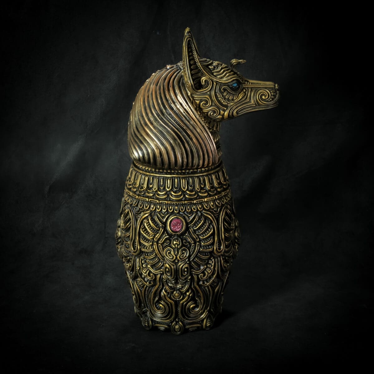Ornate Anubis figurine with intricate carvings