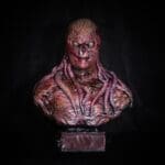 Horror sculpture with tentacles and eerie expression.