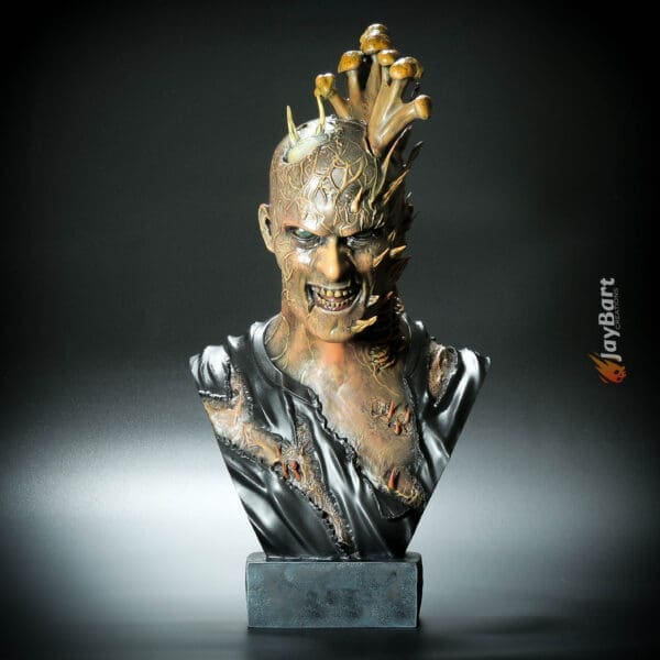 Fantasy monster bust sculpture with spikes and textures.
