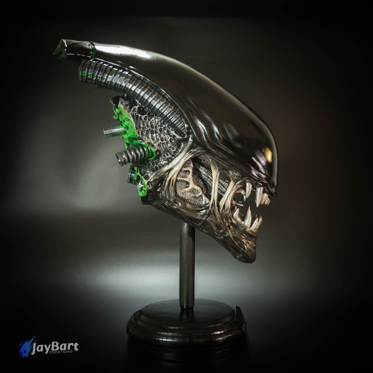 Alien head sculpture with glossy finish and details