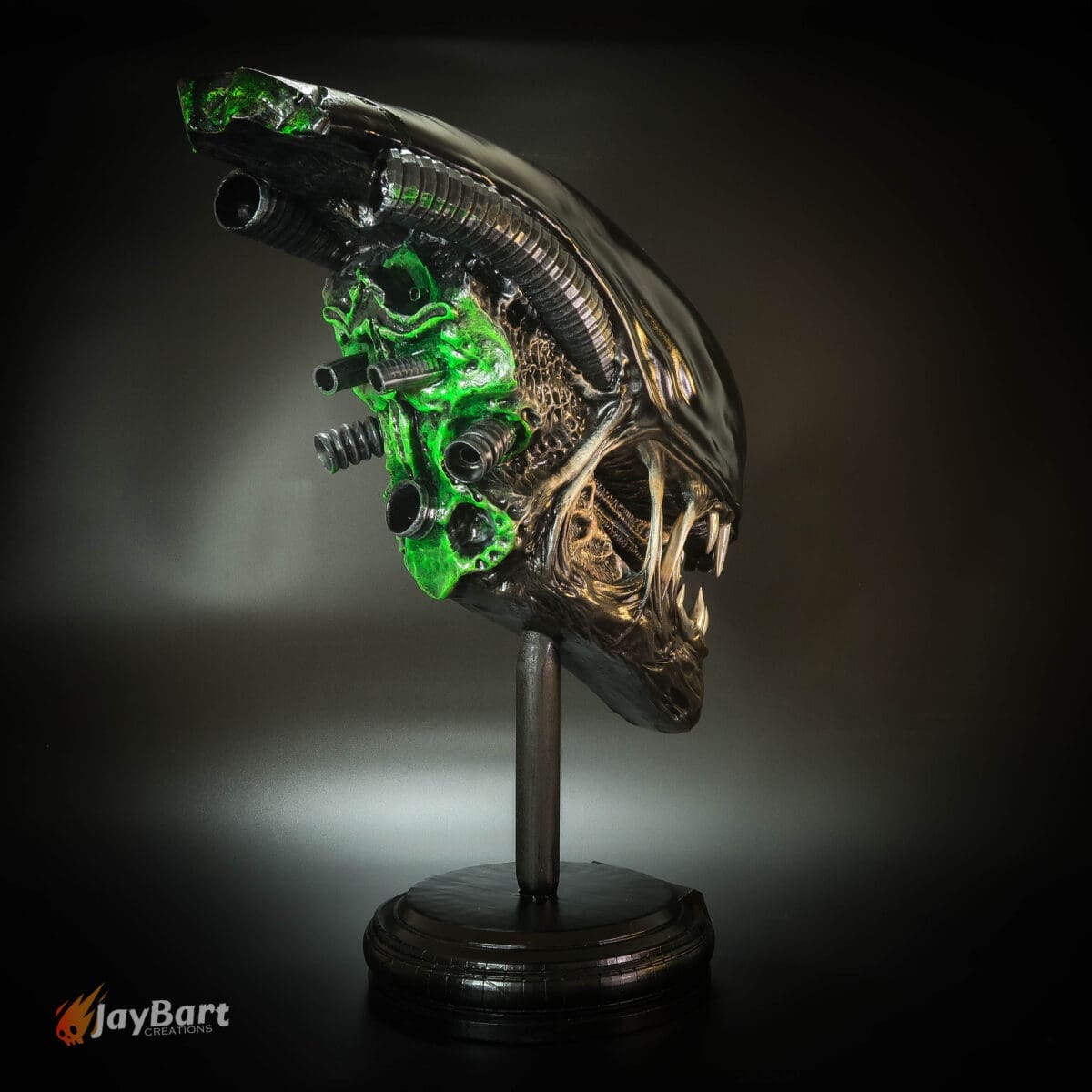 Futuristic alien creature sculpture with green accents