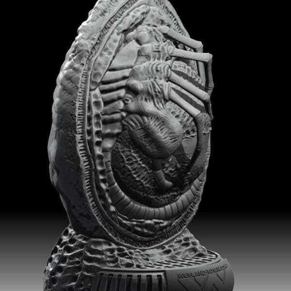 Alien egg sculpture with intricate details.