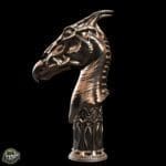 Bronze griffon head sculpture on ornate base.