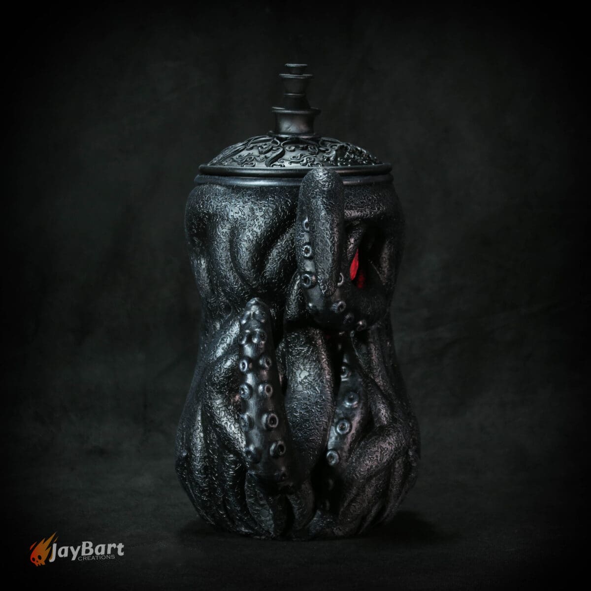 Dark sculpted tentacle-themed decorative jar